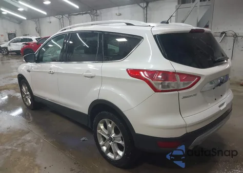 2014 Ford Escape Titanium z USA, uszkodzony, nr VIN 1FMCU9J90EUD21552